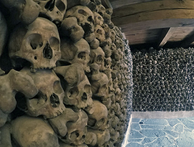 Skull wall of the Beinhaus Leuk, Swiss charnel house in Wallis; photo by Ivan Kralj.