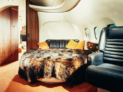 The oval fur-covered bed in Big Bunny, Playboy's iconic plane; photo by Playboy.