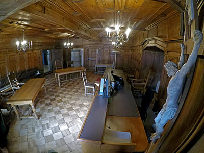 The district court room in Leuk Rathaus (town hall), Switzerland, where judge's rulings are "supervised" by a crucified Jesus; photo by Ivan Kralj.