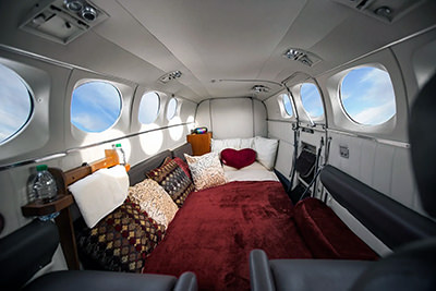 Mattress and sex position pillows-equipped interior of Love Cloud plane that offers mile high club flights; photo by Love Cloud.