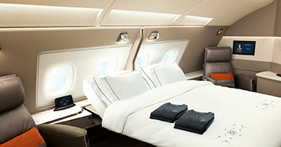 Singapore Airlines' new First Class Suite with a double bed; photo by Singapore Airlines.