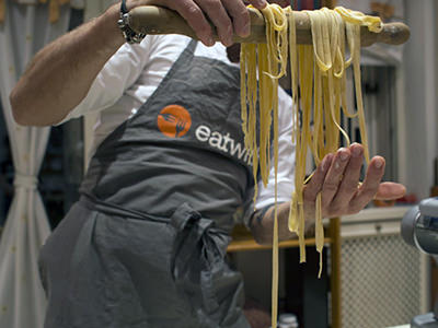Eatwith Naples, chef Gaetano displaying fresh pasta he made at his cooking class; photo by Eatwith.