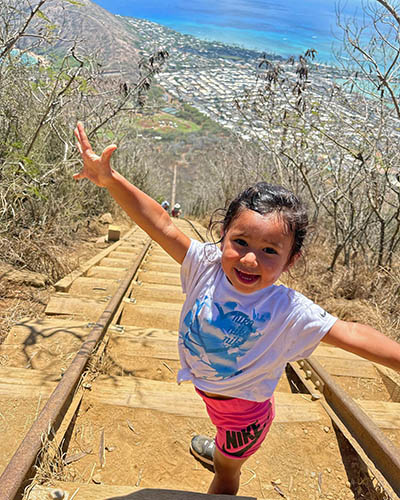 A three-year-old Journey Castillo climbing 1048 steps of the Koko Crater Trail in Hawaii, one of the kid's many hiking accomplishments.