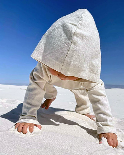 Journey Castillo playing with sand during her first visit to the White Sands National Park, one of the 63 American national parks she will visit before the age of 3