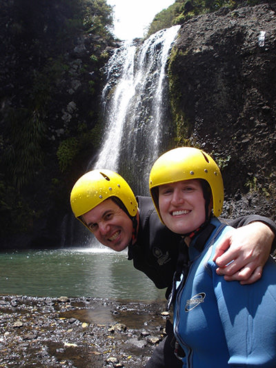 Krista Ann and Garner Knutson on their canyoning adventure during the honeymoon in New Zealand; due to the linguistic misunderstanding, the couple thought they booked a canoe tour, but ended up rappelling waterfalls.