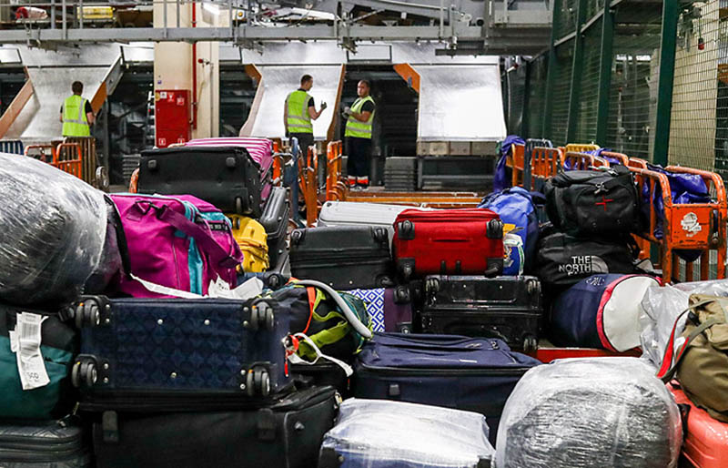 Piles of suitcases at Sheremetyevo Airport in Moscow.This photo was used and edited for several lost luggage scams on Facebook, advertising fake baggage sales. The author of the original photograph is Stanislav Krasilnikov / TASS.