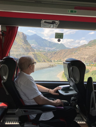 Theo Simon on a bus, during his slow travel journey from the UK to Australia.