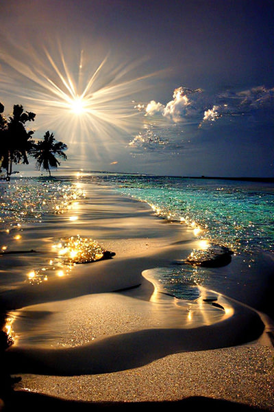 AI image of a beach in Bali, with shining sun, and sparkles in the sand and the clouds; published by Facebook page Slovak Travel.