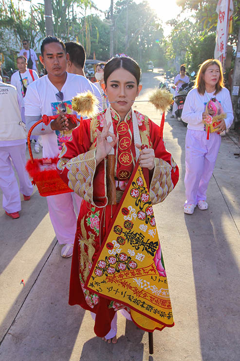 A woman (ma song spirit medium) with pierced cheeks, at Jor Soo Goong Naka Shrine, during Jay or Phuket Vegetarian Festival, also known as Thailand's self-mutilation festival; photo by Ivan Kralj.