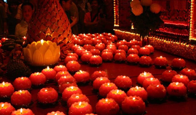 Red candles lit at the Pai Ti Kong, Hokkien New Year celebration in Penang, Malaysia; photo by Nicholas Chan.
