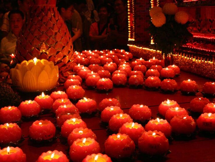Red candles lit at the Pai Ti Kong, Hokkien New Year celebration in Penang, Malaysia; photo by Nicholas Chan.
