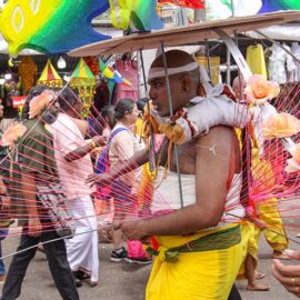 Hindu devotee carrying a mayil kavadi during Thaipusam in Penang, Malaysia; photo by Ivan Kralj.