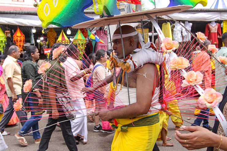 Hindu devotee carrying a mayil kavadi during Thaipusam in Penang, Malaysia; photo by Ivan Kralj.