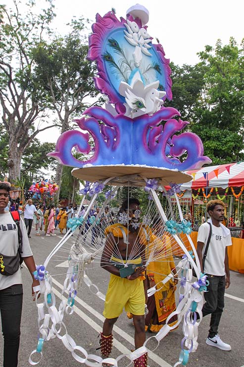 Hindu devotee carrying a mayil kavadi during Thaipusam in Penang, Malaysia; photo by Ivan Kralj.