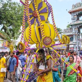 Hindu devotee carrying a mayil kavadi during Thaipusam in Penang, Malaysia; photo by Ivan Kralj.