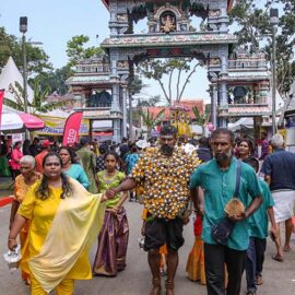 Hindu devotee carrying koodam mulle kavadi - milk pots pierced on his torso, and with cheeks pierced with a spear (alavu kavadi) in honor of Lord Murugan, during Thaipusam Festival in Penang, Malaysia; photo by Ivan Kralj.
