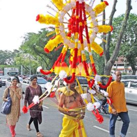 Hindu devotee carrying a mayil kavadi during Thaipusam in Penang, Malaysia; photo by Ivan Kralj.