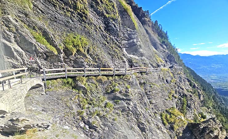 Cliffside pathway following the Bisse du Torrent Neuf in Saviese, Switzerland; photo by Ivan Kralj.