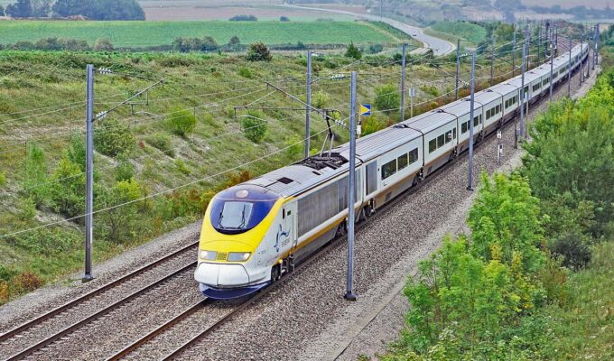 Eurostar train travels from Paris to London under the English Channel, here shot at Calais; photo by Erich Westendarp / Pixabay.