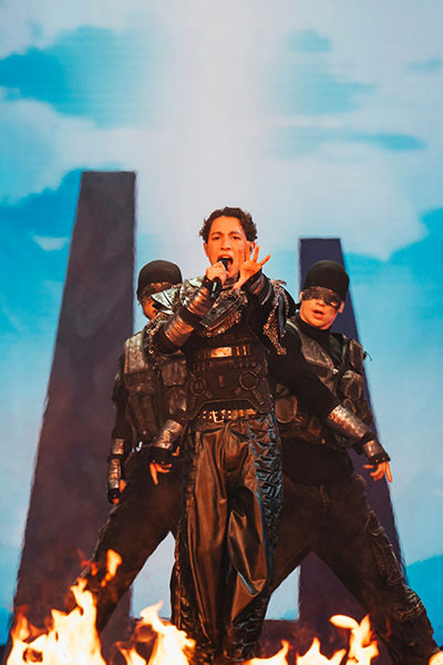Kyle Alessandro performing "Lighter" as Norway's Eurovision act in Basel, Switzerland, with backup dancers; photo by Sarah Louise Bennett / EBU.