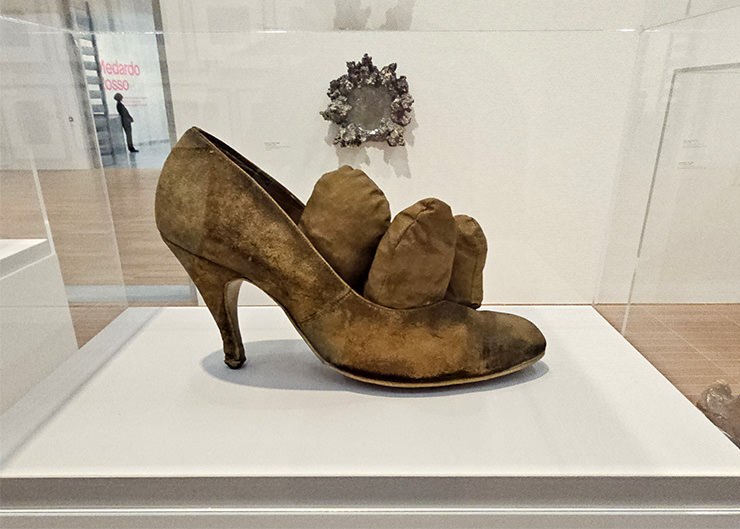 "Phallic Shoe" soft sculpture by Yayoi Kusama encased in a glass box at the Kunstmuseum Basel in Switzerland; photo by Ivan Kralj.