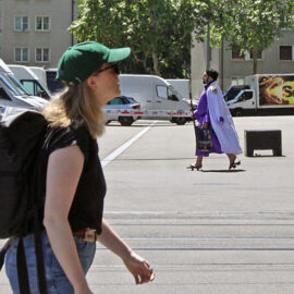 Cosplayer dressed as Admiral Issho (Fujitora) from "One Piece" manga series, walking down the street at Fantasy Basel, the Swiss Comic Con; photo by Ivan Kralj.