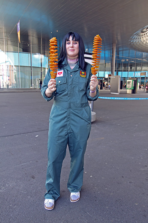 Cosplayer dressed as Anya from "Mouthwashing" psychological horror game, holding two tornado potatoes, at Fantasy Basel, the Swiss Comic Con; photo by Ivan Kralj.
