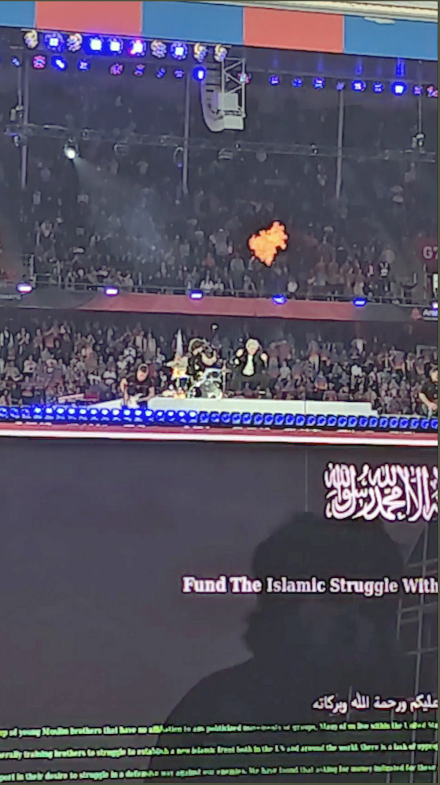 A screenshot from Pipeaway's YouTube short video exposing the on-screen message "Fund the Islamic Struggle Without Leaving a Trace" under Baby Lasagna band performing at St. Jakob-Park stadium in Basel, Switzerland, during Arena Plus Eurovision pre-show.
