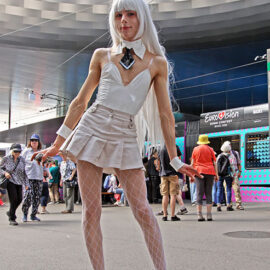 Cosplayer dressed as Blanc bunny girl from "Goddess of Victory: Nikke" sci-fi RPG shooter game, at Fantasy Basel, the Swiss Comic Con; photo by Ivan Kralj.