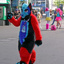 Piwipp, the furry, walking with a GoPro on a selfie stick at Basel Fantasy, the Swiss Comic Con; photo by Ivan Kralj.