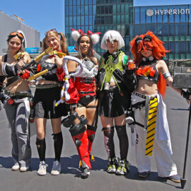 Cosplayers dressed up as Grace Howard, Lucy, Nekomata, Anby Demara, and Koleda, from "Zenless Zone Zero" role-playing game, at Fantasy Basel, the Swiss Comic Con; photo by Ivan Kralj.