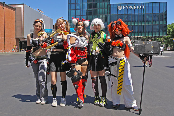 Cosplayers dressed up as Grace Howard, Lucy, Nekomata, Anby Demara, and Koleda, from "Zenless Zone Zero" role-playing game, at Fantasy Basel, the Swiss Comic Con; photo by Ivan Kralj.