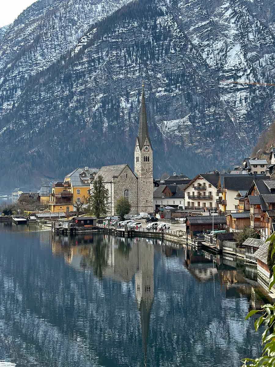 Steeple of lakeside Evangelical Church in Hallstatt, Austria; photo by Antonis Tsatas, Unsplash.