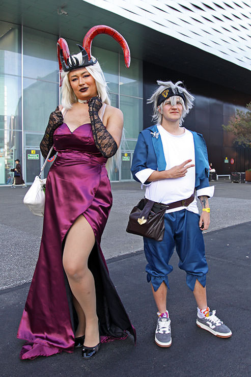 Cosplayers dressed as Lilith Morningstar from the "Hazbin Hotel" TV show, and Asta from the "Black Clover" manga series, at Fantasy Basel, the Swiss Comic Con; photo by Ivan Kralj.