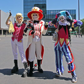 Cosplayers dressed Lucifer Morningstar from "Hazbin Hotel" TV show and Fizzarolli from "Helluva Boss" web series, at Fantasy Basel, the Swiss Comic Con; photo by Ivan Kralj.