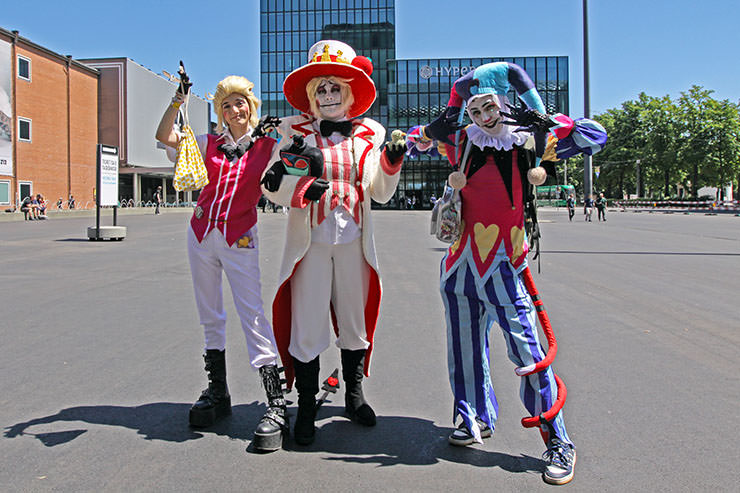 Cosplayers dressed Lucifer Morningstar from "Hazbin Hotel" TV show and Fizzarolli from "Helluva Boss" web series, at Fantasy Basel, the Swiss Comic Con; photo by Ivan Kralj.
