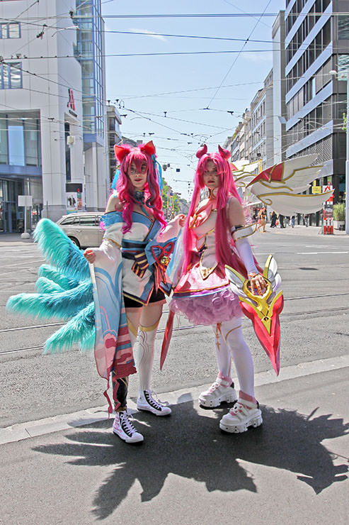 Cosplayers dressed as Spirit Blossom Ahri and Kaisa from the "League of Legends" multiplayer online battle arena, at Fantasy Basel, the Swiss Comic Con; photo by Ivan Kralj.