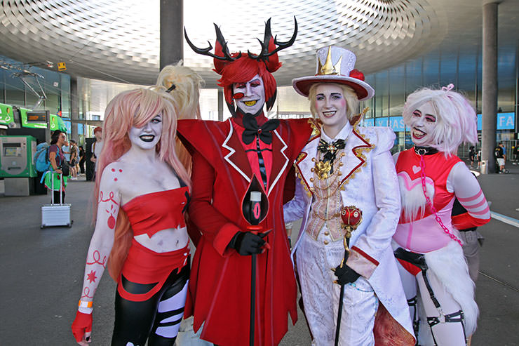 Cosplayers dressed up as Vaggie, Alastor, Lucifer Morningstar, and Angel Dust from "Hazbin Hotel" TV show, at Fantasy Basel, the Swiss Comic Con; photo by Ivan Kralj.