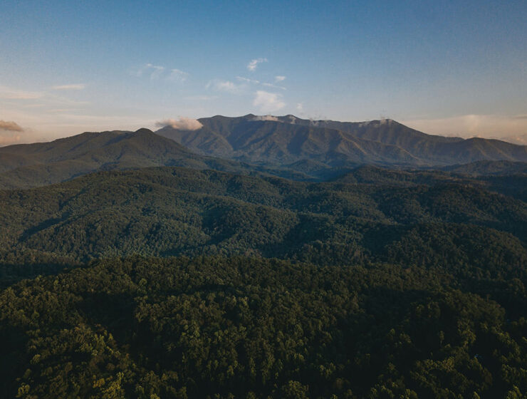 A tree-covered landscape of the Great Smoky Mountain National Park, as seen from Gatlinburg; photo by Steven Van Elk, Unsplash.
