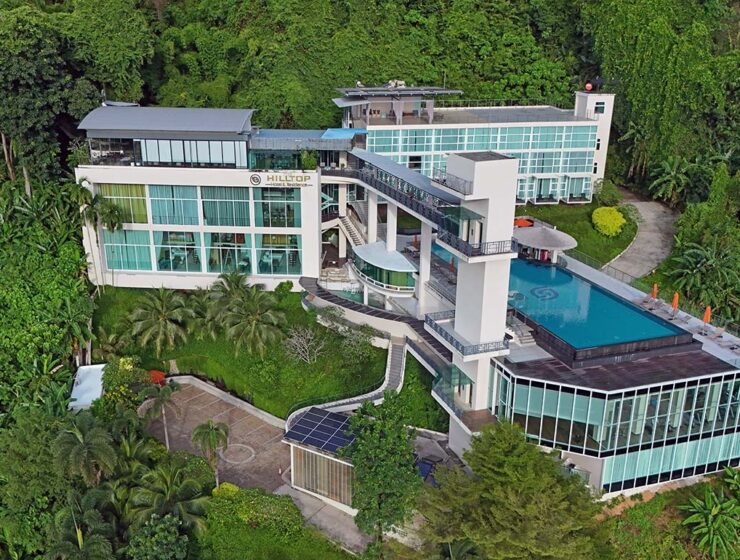 Aerial view of the Hilltop Wellness Resort exterior with an infinity swimming pool, in Phuket, Thailand; drone photo by Ivan Kralj.