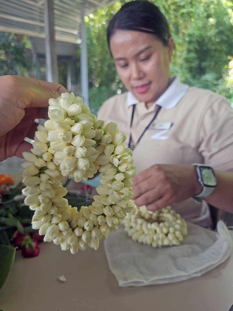 A part of the flower garland in progress at the workshop led by the housekeeper Nam at Hilltop Wellness Resort in Phuket, Thailand; photo by Ivan Kralj.