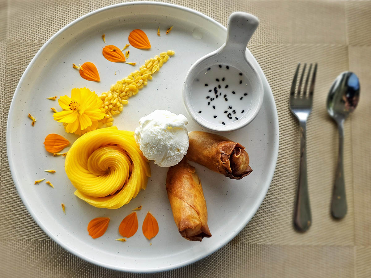 Mango sticky rice with fried sticky rice spring roll and vanilla ice cream, a modern reinterpretation of the classic Thai dessert; photo taken at Plearn Restaurant, Hilltop Wellness Resort in Phuket, Thailand by Ivan Kralj.
