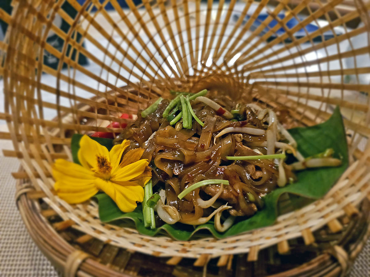 Pad-mhee Korat, signature noodles from the Plearn Restaurant chef's hometown, served at Hilltop Wellness Restaurant in Phuket, representing Northeastern Thailand cuisine; photo by Ivan Kralj.