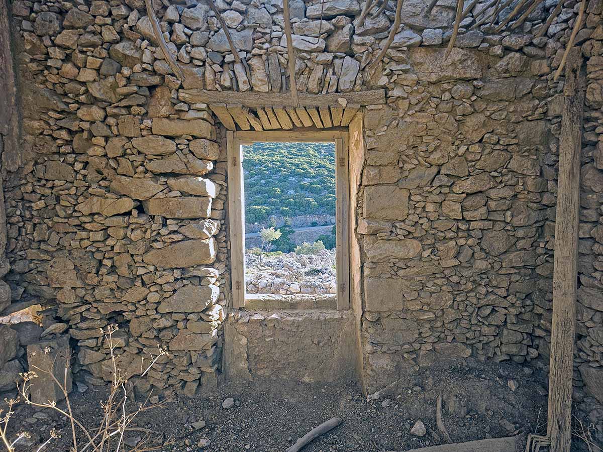 The intricate stone wall inside the house at Kato Chora, the abandoned village on Kythira Island, Greece; photo by Ivan Kralj.