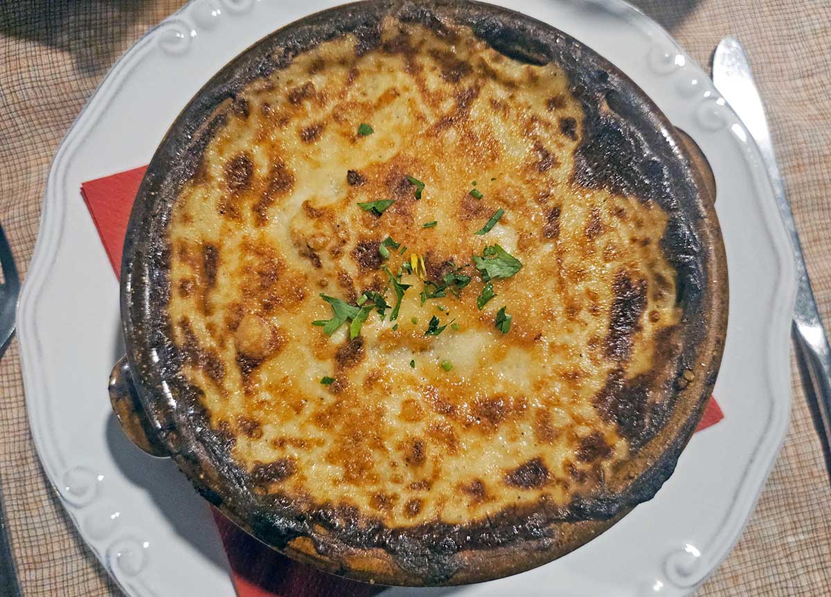 Pasticcio, a traditional Greek dish, as served at Platanos Restaurant in Mylopotamos, on the island of Kythira, Greece; photo by Ivan Kralj.