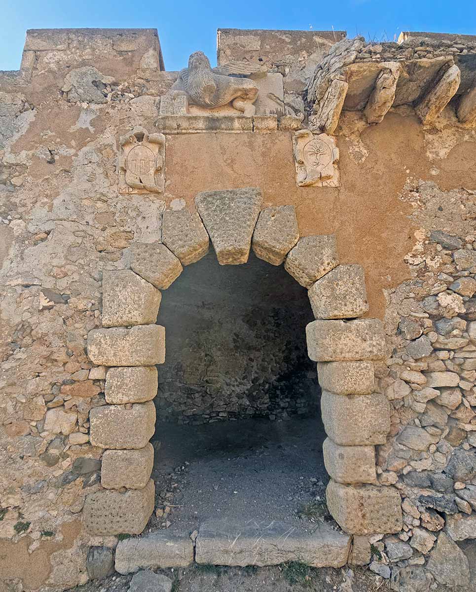 Winged Lion of St. Mark, the emblem of the Republic of Venice, displayed above the stone-arch entrance to Kato Chora, in Kythira Island, Greece; photo by Ivan Kralj. 