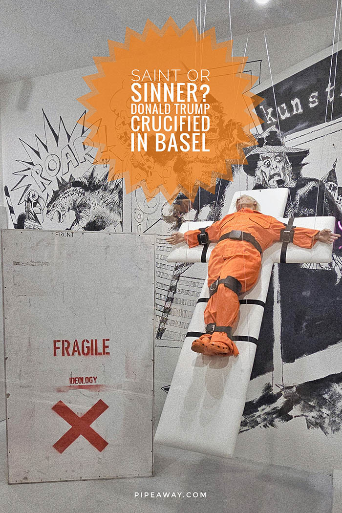 Kunstmeile Basel, a public art promenade, displayed Mason Storm's newest controversial artwork in one of its gallery windows - "Saint or Sinner?" shows US President Donald Trump in an orange prison jumpsuit, strapped to a white cross. Is this a powerful criticism, mockery of Christianity, or just a cheap shock art stunt?