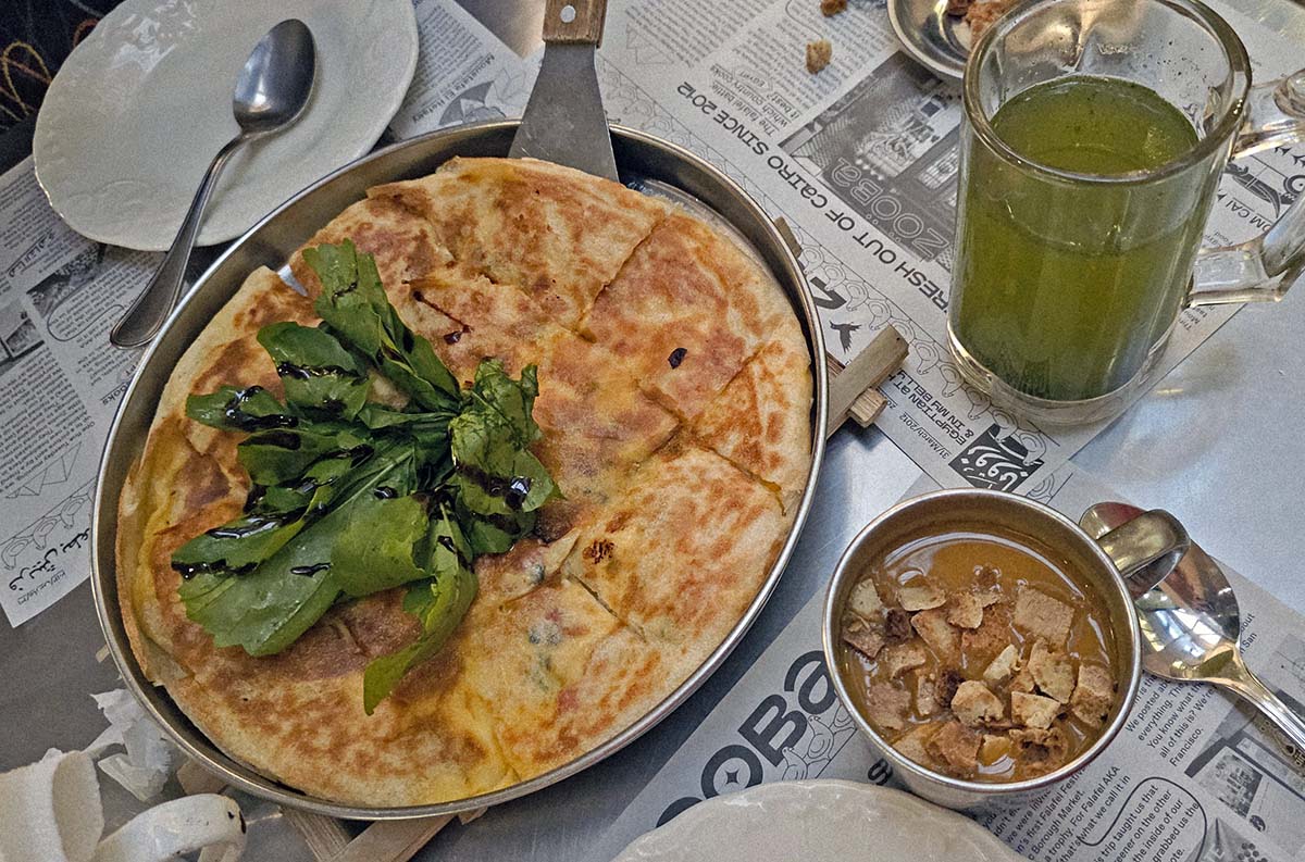 Five-cheese feteer (flaky Egyptian layered pastry), as served at Zooba, a street-food style restaurant in the Grand Egyptian Museum in Giza; photo by Ivan Kralj.