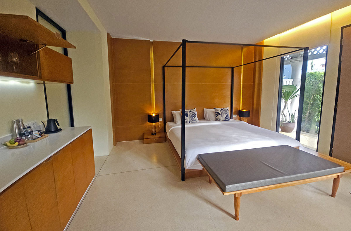 A four-poster king-size bed dominating the bedroom at the Suite with Couple Bath of Anda Mani Khao Lak Beachfront Villas, Thailand; photo by Ivan Kralj.