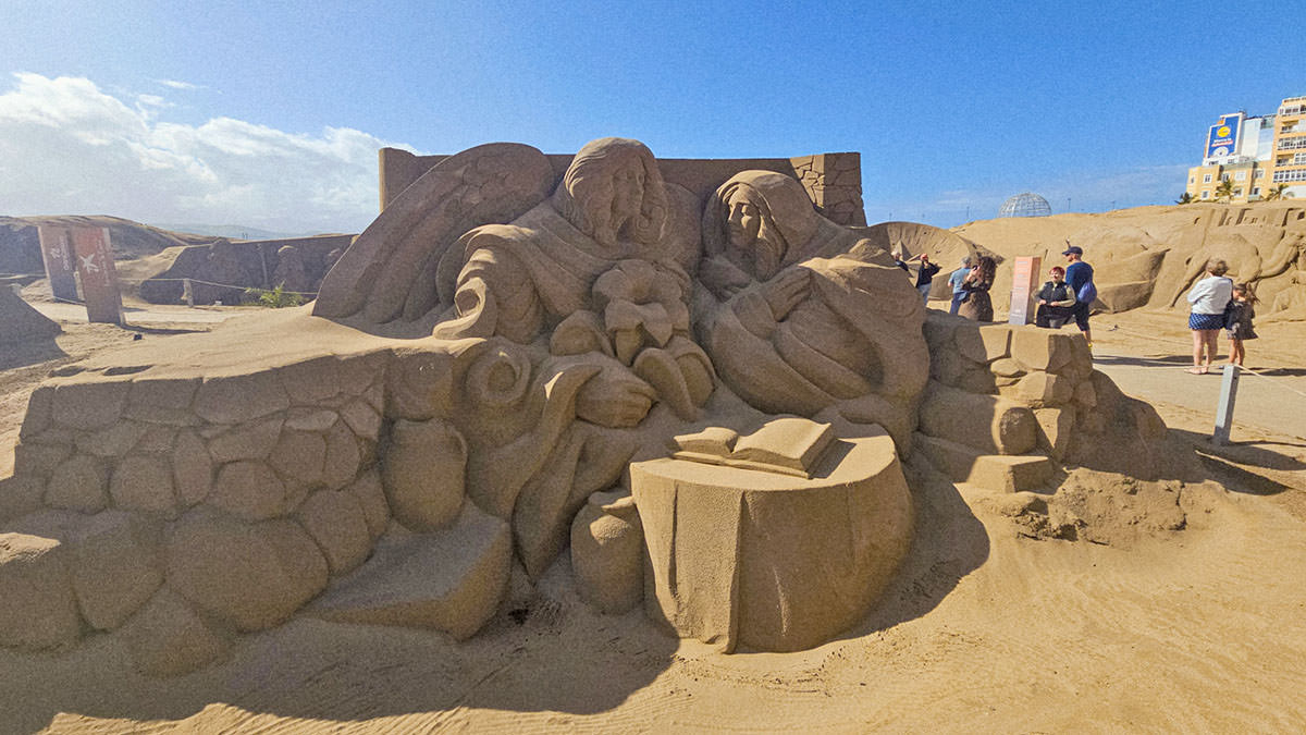 Sand nativity scene, or Belén de Arena in Spanish, representing annunciation, at Playa de las Canteras in Las Palmas, Grand Canaria, Spain; photo by Ivan Kralj. 
